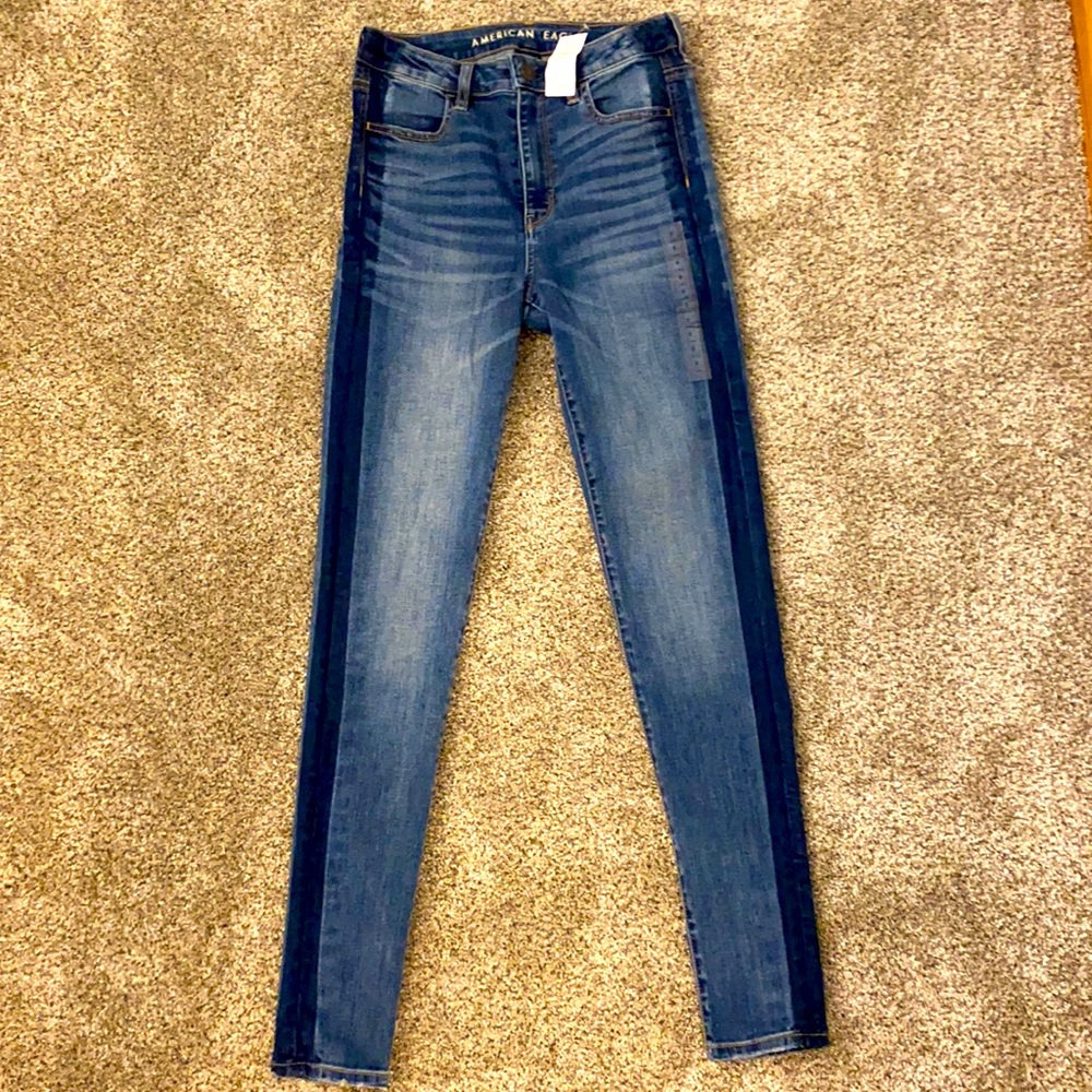 American eagle size 8 long jeans super stretch with dark stipe detail down side